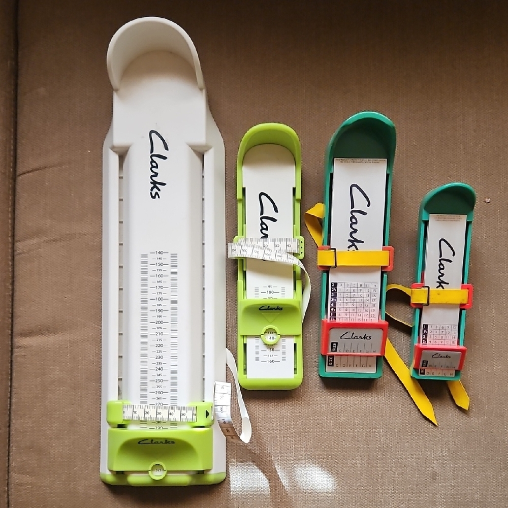 Clarks Shoe Measuring Tools in White, Green, and Red